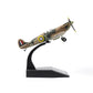 NUOTIE Supermarine Spitfire diecast model displayed on stand in side profile with camouflage pattern