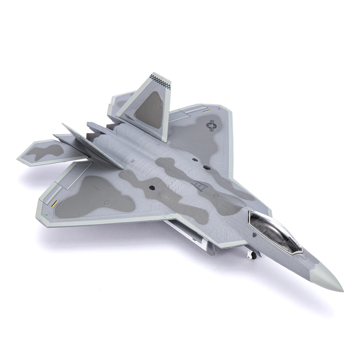NUOTIE F-22 Raptor model in gray camouflage, top view, aircraft details visible