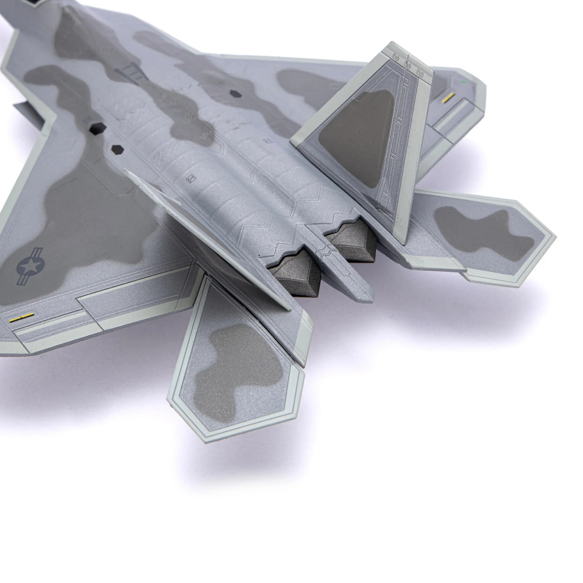 NUOTIE F-22 Raptor diecast model showcasing rear view and engine details, aircraft side profile